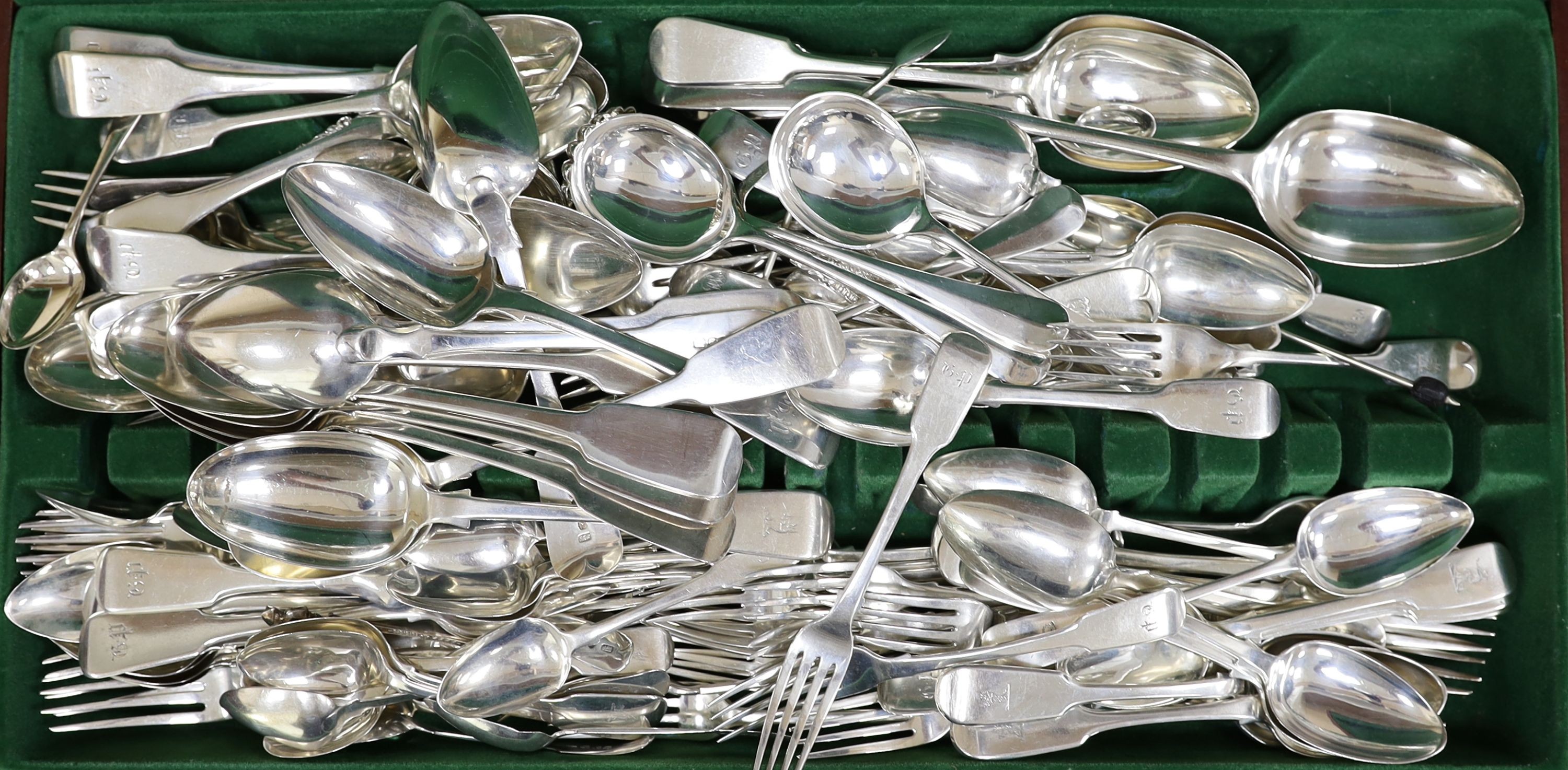 A harlequin canteen of Georgian and later silver and plated mainly fiddle pattern flatware